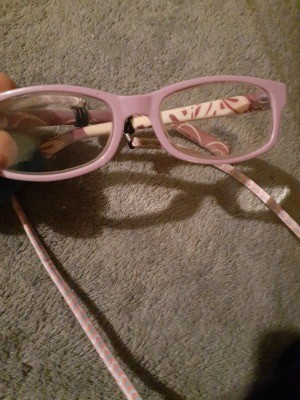 A pair of pink eyeglasses.
