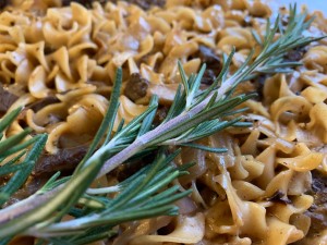 A casserole with beef and mushrooms.