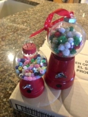 Mini Gumball Machine Christmas Ornament - two completed ornaments, one with pom poms and one with plastic beads