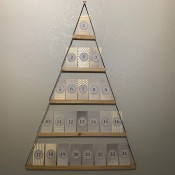 The completed advent calendar on the wall.