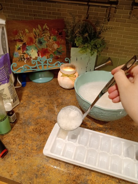 Soap Jellies - ladling into ice cube tray