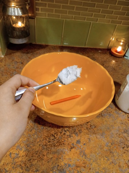 DIY Crayon Lipgloss - adding coconut oil to bowl with the crayon