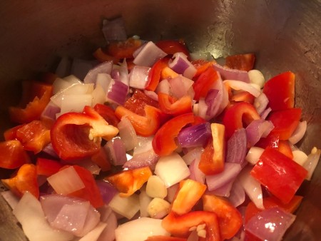 Vegetables in a large pot.