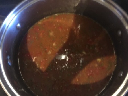 Adding the ingredients to a pan.