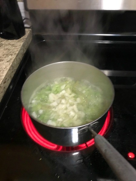 Cooking vegetables in water, in a small sauce pan.
