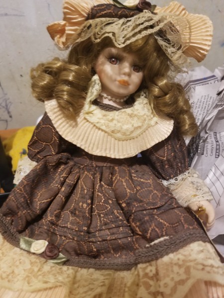 An ornate porcelain doll.