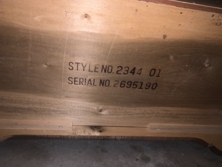 Numbers on the bottom of a cedar chest.