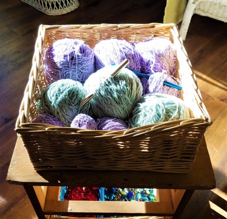 Converting a Drawer Unit Into a Footstool - drawer filled with balls of yarn