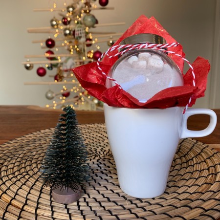A gift mug with homemade hot chocolate.