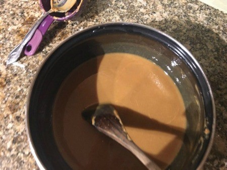 Mixing the caramel in a sauce pan.