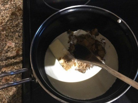 Mixing the chocolate fudge in a sauce pan.