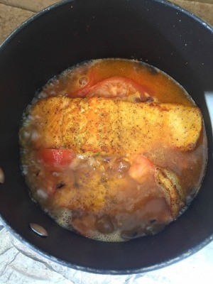 The completed meal in a frying pan.