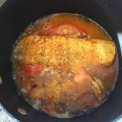 The completed meal in a frying pan.