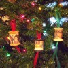 Spool ornaments hanging on the tree.