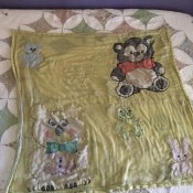 An old and worn baby blanket.