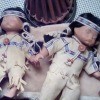 Two Native American porcelain dolls.