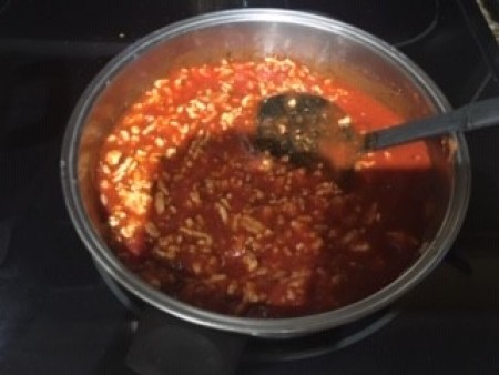 A pot of spaghetti sauce.
