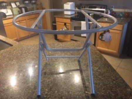 The metal frame of a table.