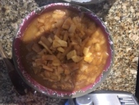 A bowl of apple filling.