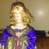 A princess doll in ornate clothing.