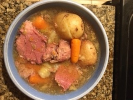 A completed pot of corned beef and cabbage.