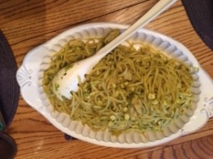 A serving platter of spaghetti chicken.