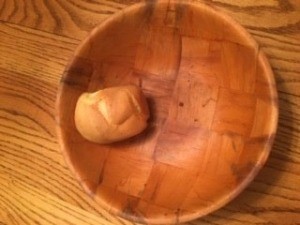 A blender popover in a wooden bowl.