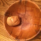 A blender popover in a wooden bowl.