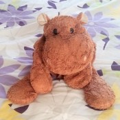 A stuffed brown hippo.