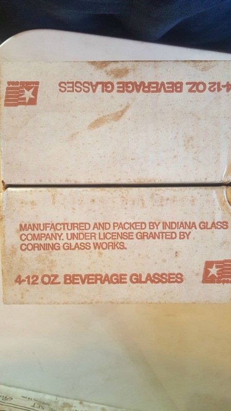 The markings on the back of a glass package.