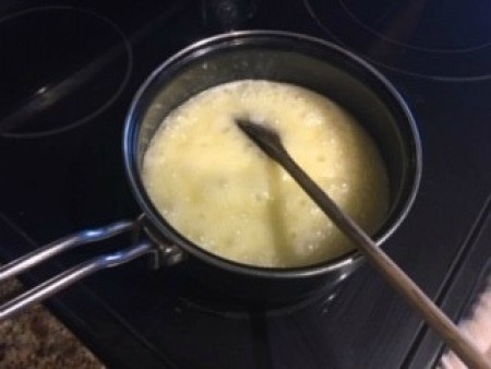 Cooking toffee ingredients in a pan.