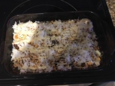 The cookie bars being baked in an oven.