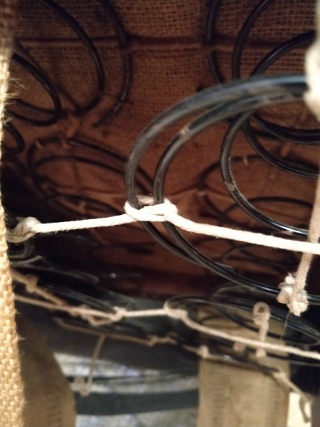 The springs on the bottom of an vintage chair.