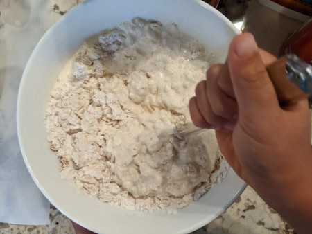Mixing up the batter for scones.