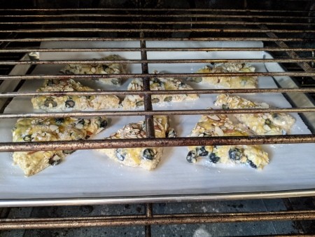 Baking the scones in an oven.