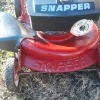 A vintage snapper push mower.