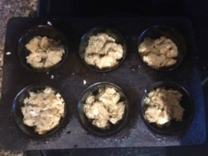 Individual Apple Crisps in a muffin tin.