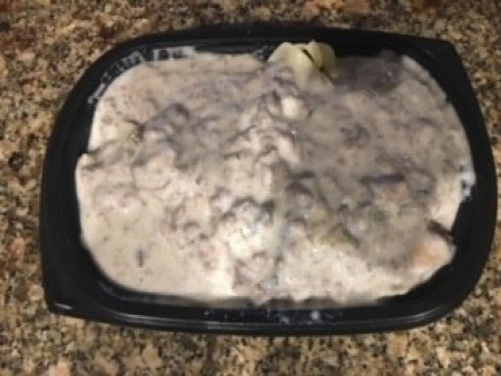 A finished plate of beef stroganoff.