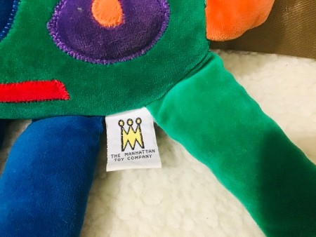 A label on a stuffed toy.