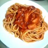 A plate of pasta and sauce.