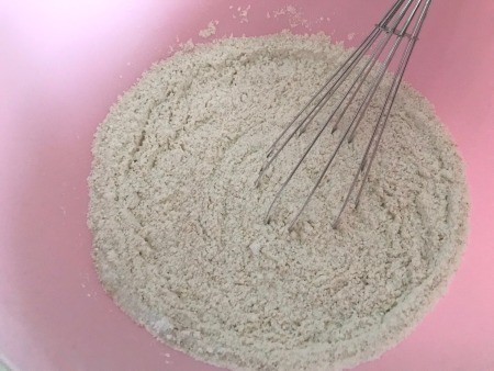 Mixing the pancake batter in a bowl.