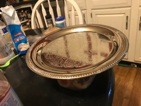 A silver tray on a table.