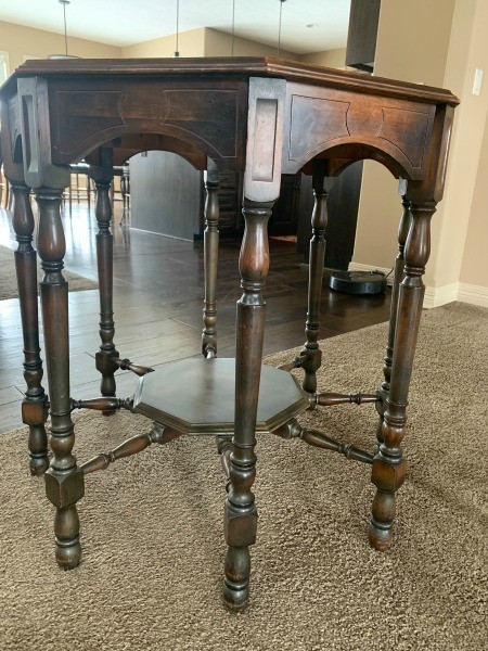 An eight legged wooden table.