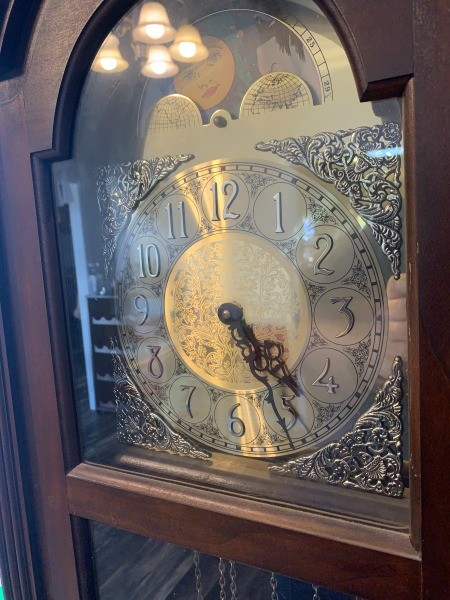 The face of a grandfather clock.