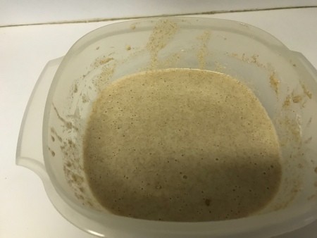 The waffle batter in a bowl