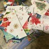 A pile of cut up Christmas cards