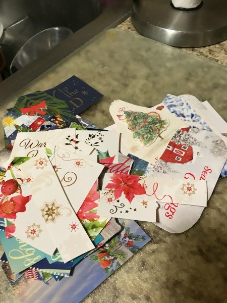 A pile of cut up Christmas cards
