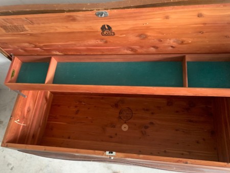 Inside a cedar chest with a tray.