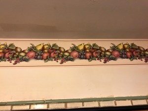 A wallpaper border with a fruit theme.