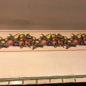 A wallpaper border with a fruit theme.